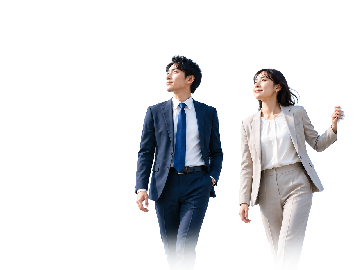 スーツ姿で歩く男女の社員